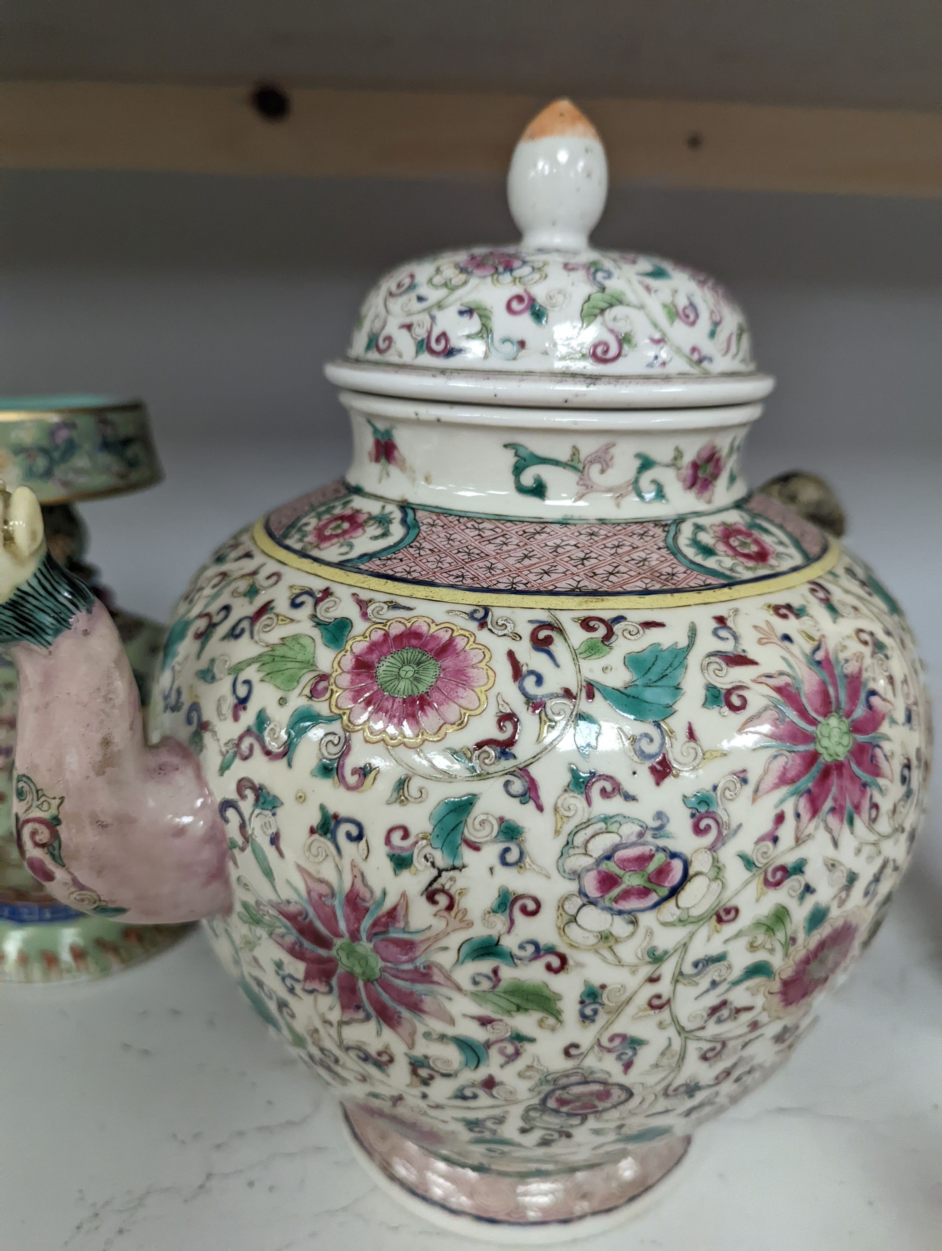 A large 19th century Chinese famille rose wine pot, and another wine pot, tallest 27cm